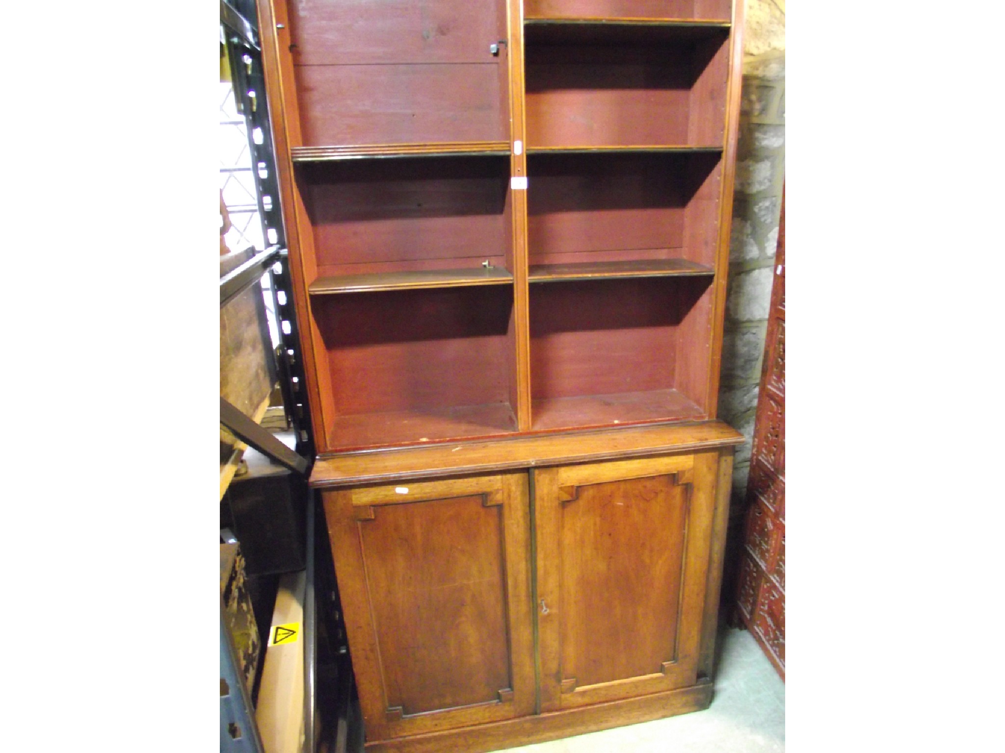 Appraisal: A th century mahogany and stained pine two sectional library