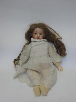 Appraisal: A Hermann Steiner bisque head girl doll with fixed brown