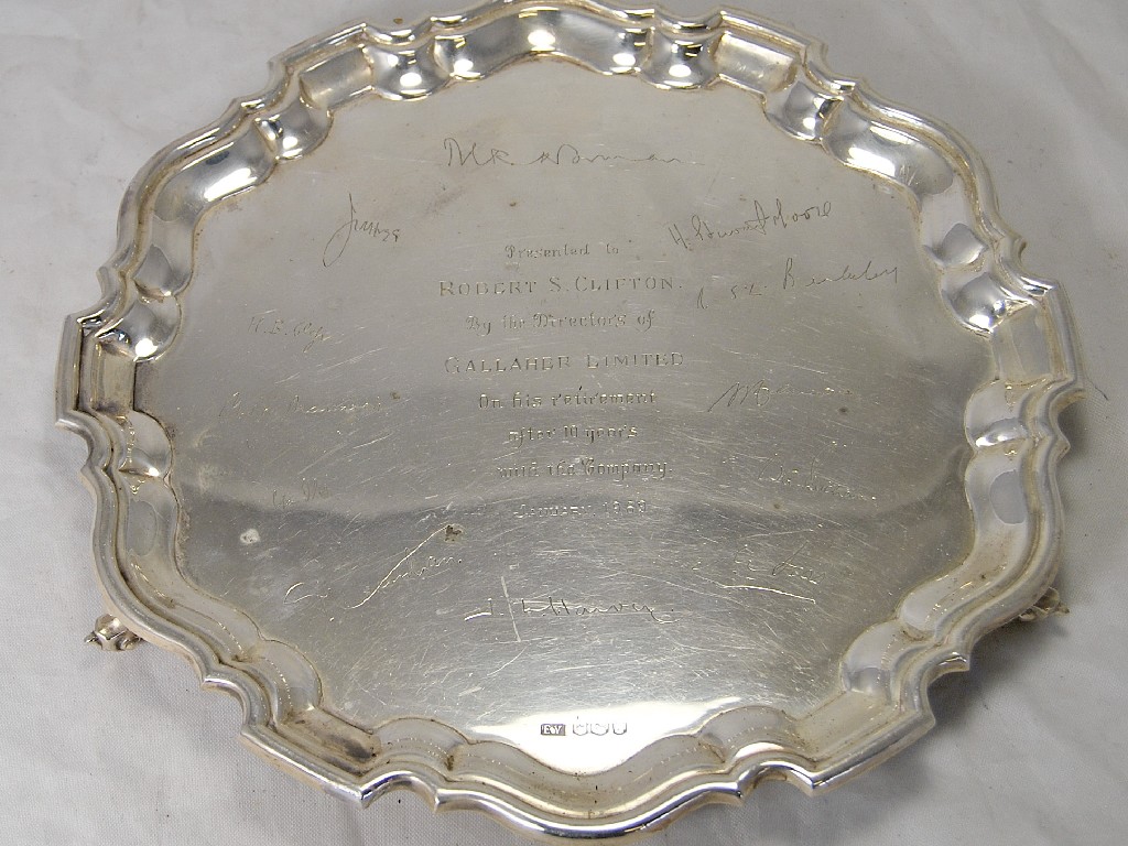 Appraisal: Silver salver on three shell feet engraved etc Sheffield approx