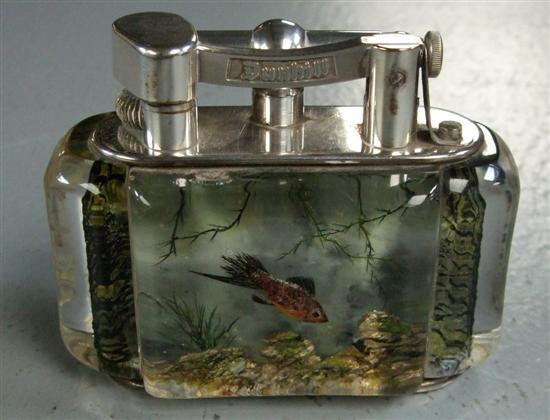 Appraisal: Dunhill 'Aquarium' table lighter circa the shaped clear body decorated