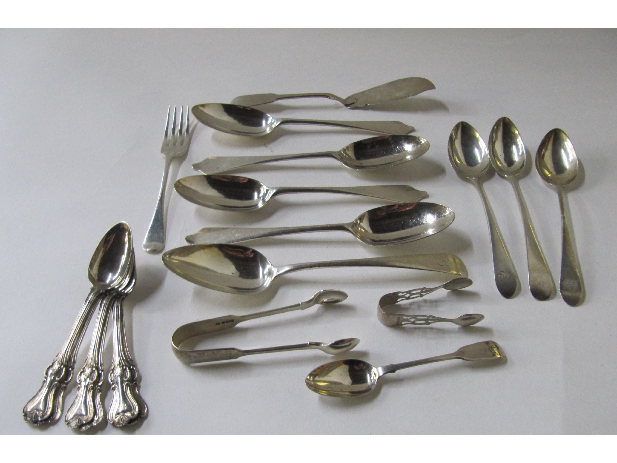 Appraisal: A lot comprising assorted silver spoons knives tongs etc assorted