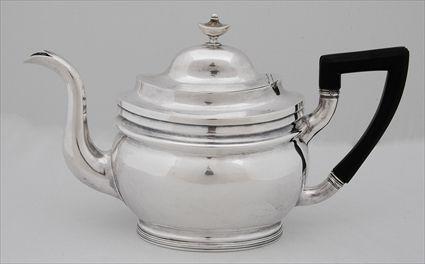 Appraisal: W G FORBES SILVER TEAPOT With crest marks the oval