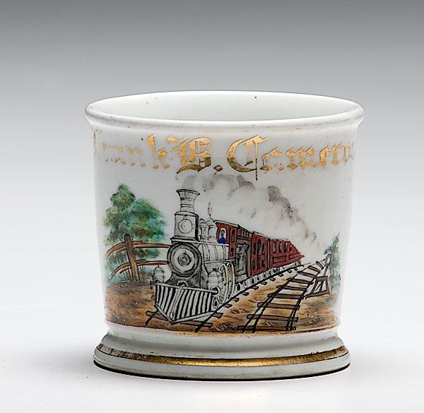 Appraisal: TRAIN ENGINEER'S OCCUPATIONAL SHAVING MUG porcelain with polychrome painted scene