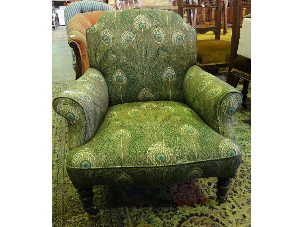 Appraisal: A Victorian occasional chair with shaped arms and Liberty style