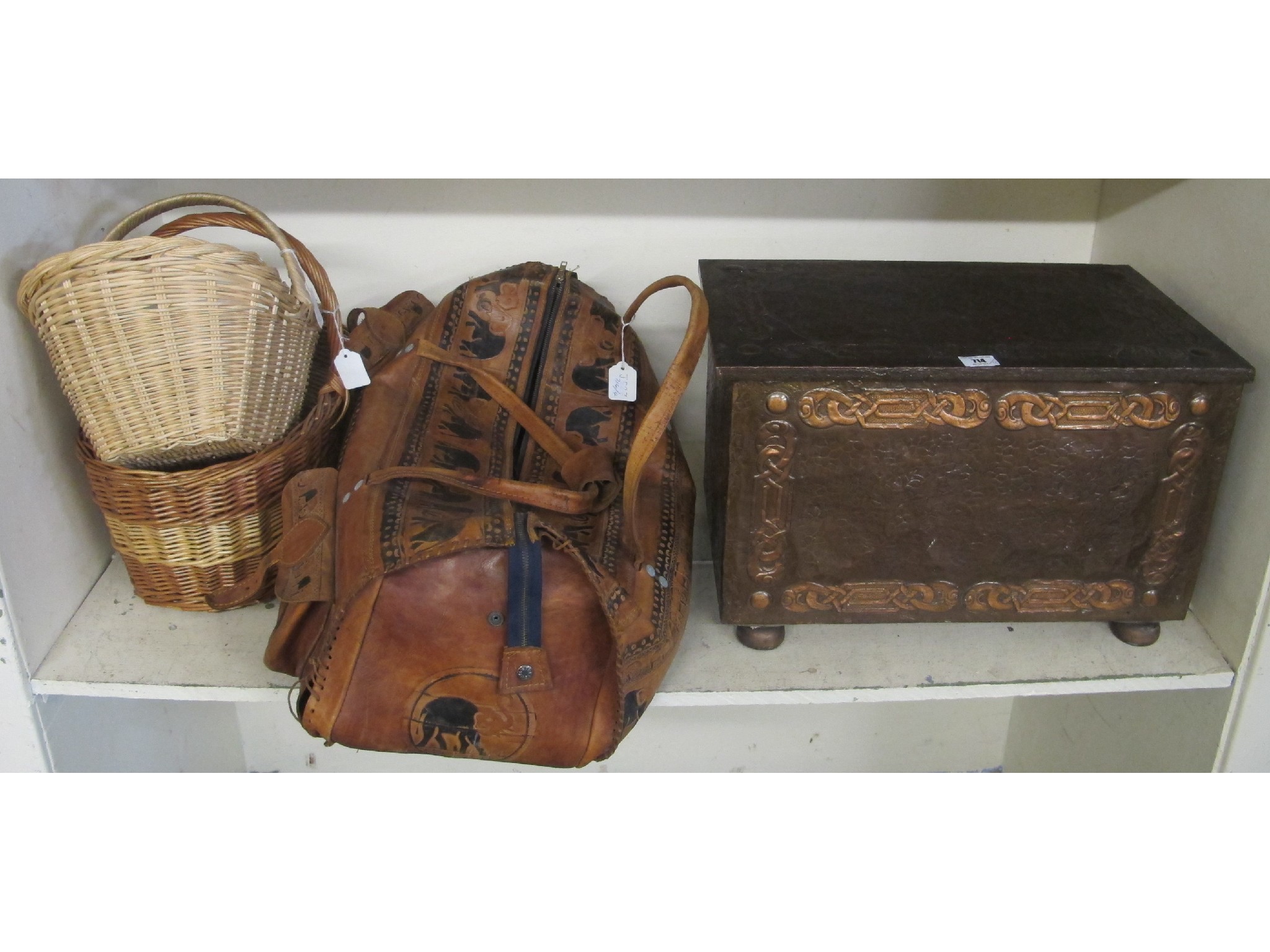 Appraisal: A copper log box leather holdall and two baskets