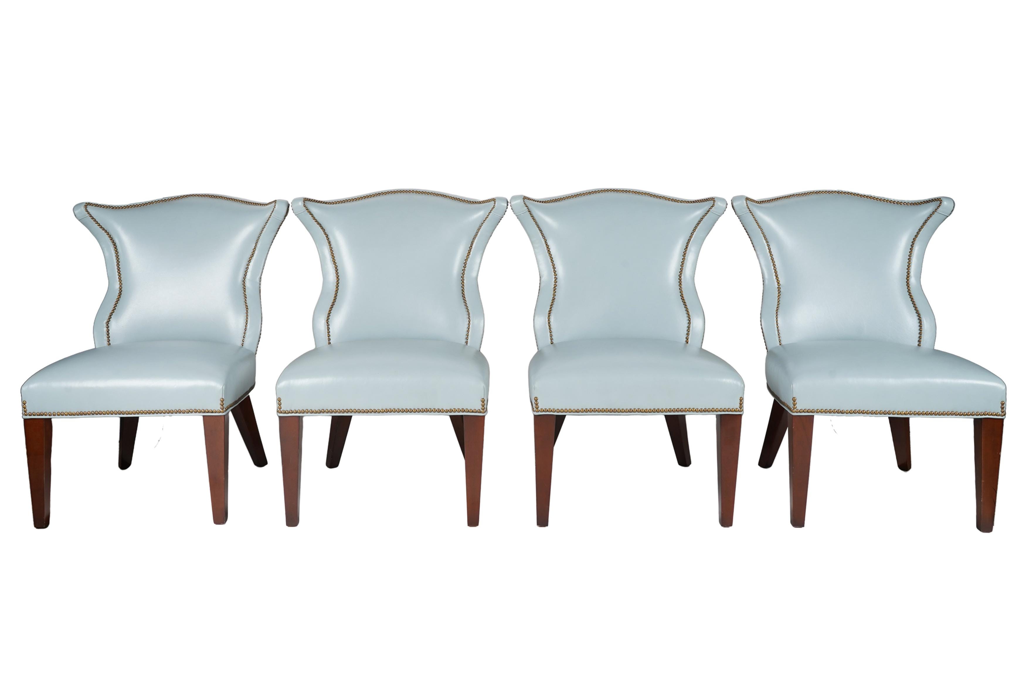 Appraisal: SET OF FOUR BLUE LEATHER CHAIRS unsigned each with floral