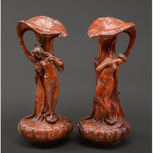 Appraisal: A pair of Continental art nouveau bronze painted plaster figural