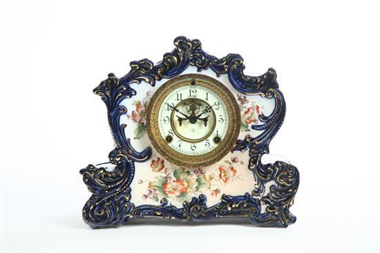 Appraisal: MANTLE CLOCK Time and strike clock with porcelain dial outside