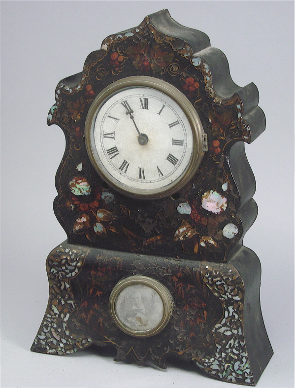 Appraisal: IRON MANTEL CLOCK th CenturyWith mother-of-pearl decoration Strike movement not