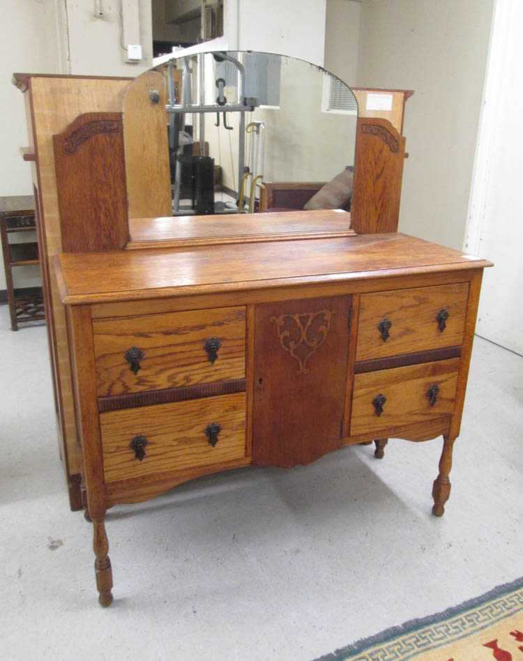 Appraisal: AN OAK SIDEBOARD English early th century H x W