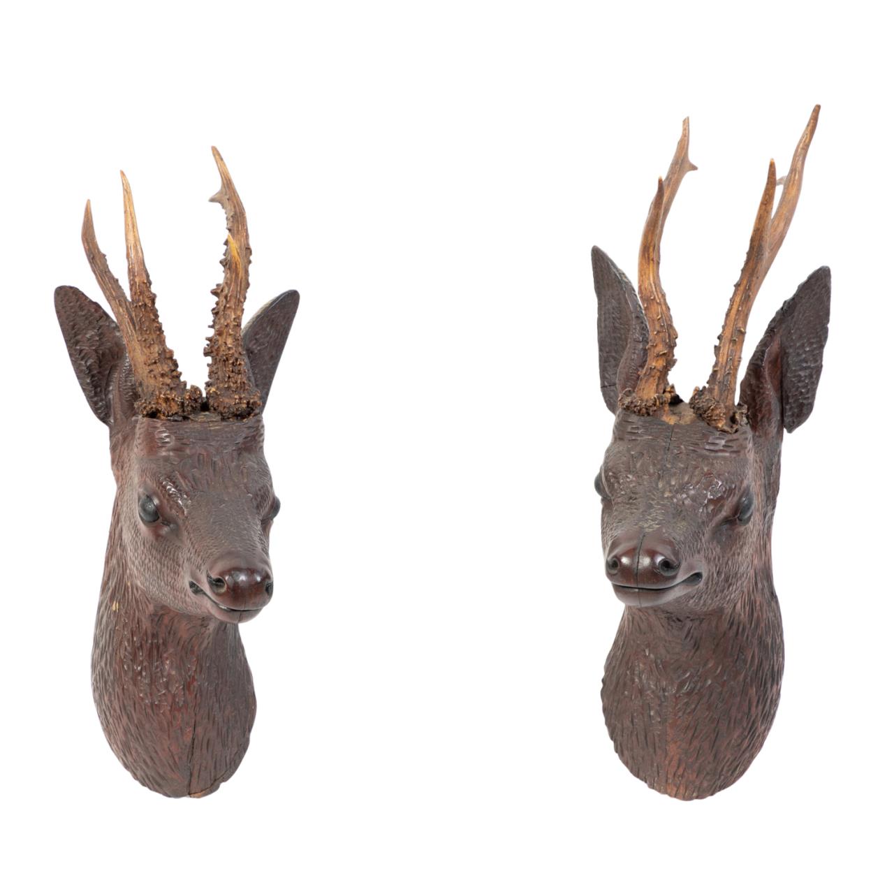 Appraisal: TWO BLACK FOREST WOODEN DEER'S HEAD TROPHIES Group of two