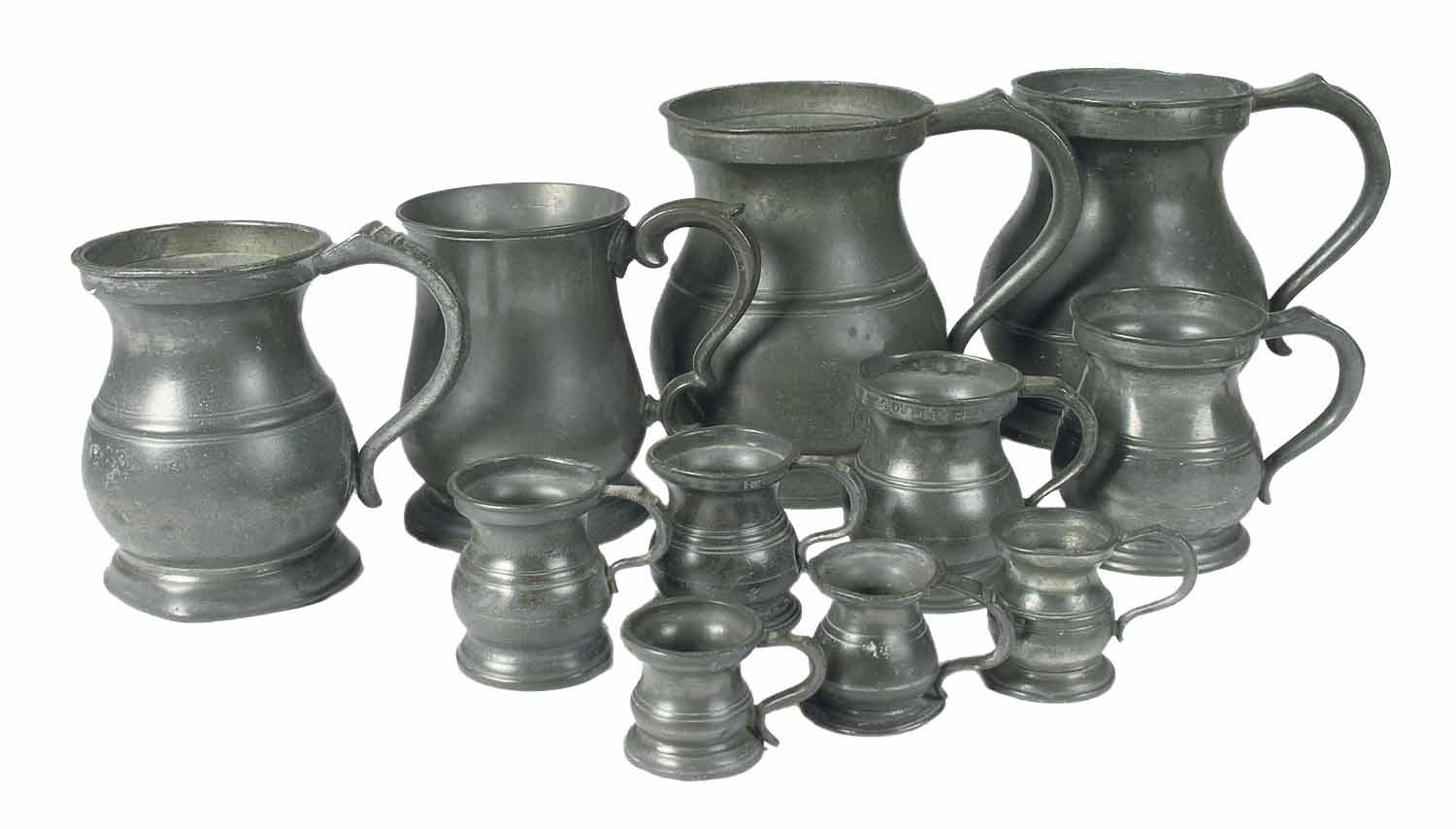 Appraisal: A group of fifteen pewter baluster measures