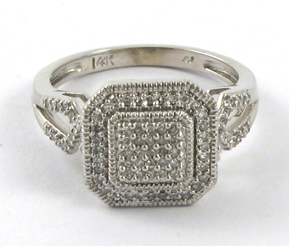 Appraisal: DIAMOND AND FOURTEEN KARAT GOLD RING The top half of