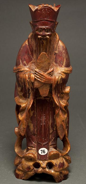 Appraisal: Chinese carved fruitwood figure of an official th century wearing