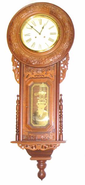 Appraisal: A reproduction drop dial clock height ft in width in