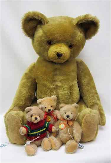 Appraisal: FOUR COLLECTIBLE ''TEDDY'' BEARS with mohair covers glass eyes three