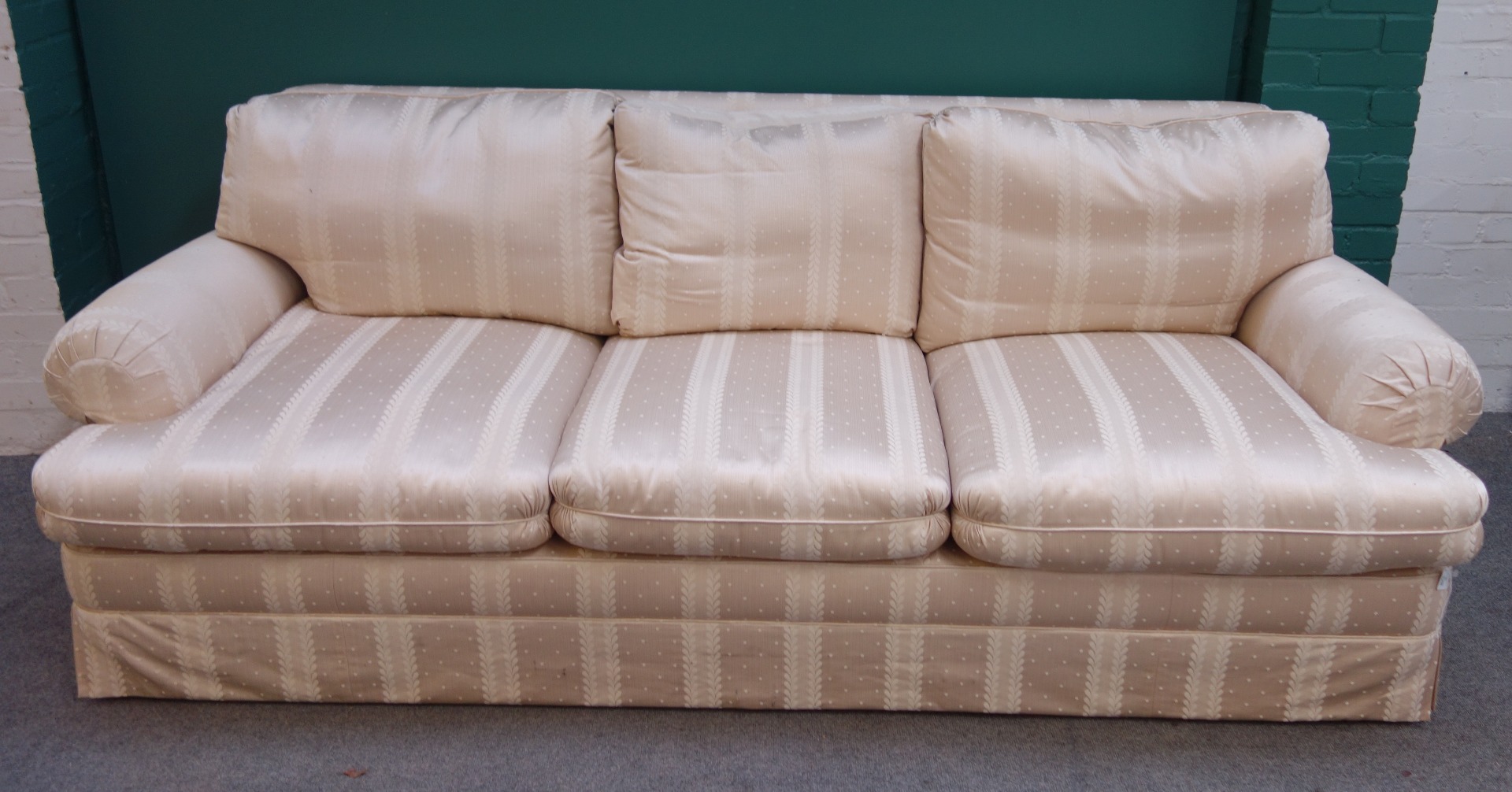 Appraisal: Kingcome Sofas Ltd a modern three seat sofa with roll