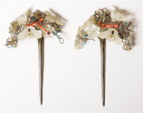 Appraisal: A PAIR OF CORAL JADE AND KINGFISHER FEATHER HAIR NEEDLES