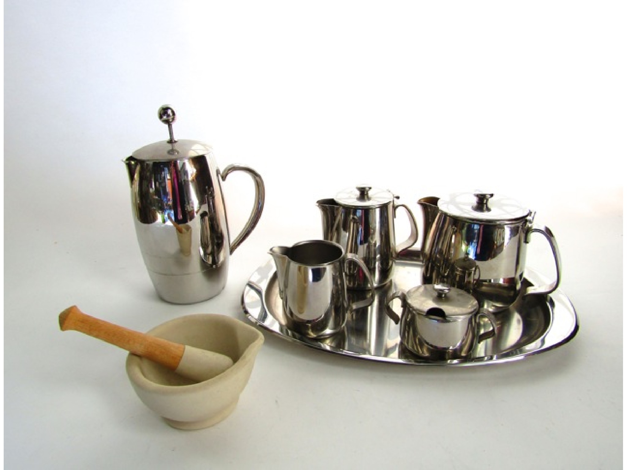 Appraisal: A contemporary five piece stainless steel tea set by Alessi