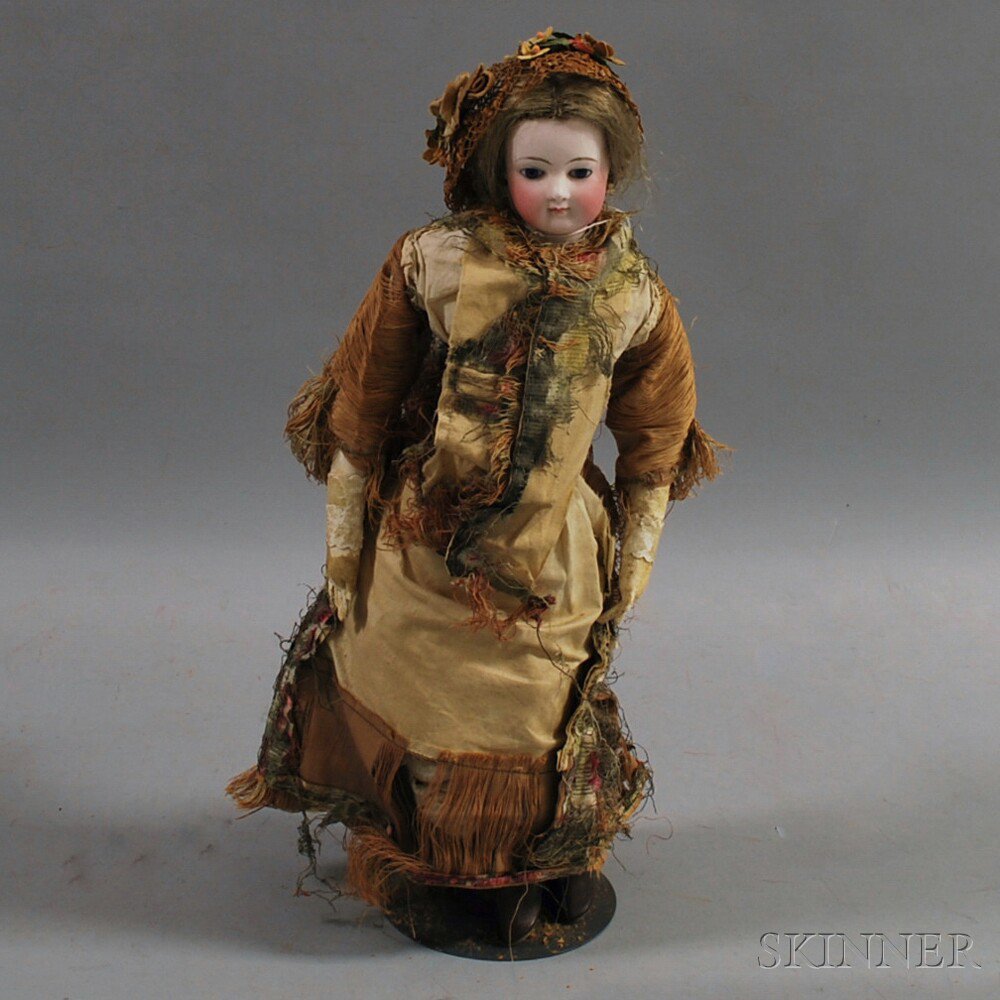 Appraisal: French Bisque Shoulder Head Lady Doll late th century blue