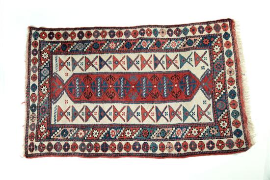 Appraisal: ORIENTAL RUG Late th century Turkish rug in ivory with