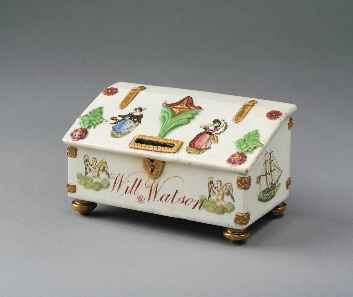 Appraisal: STAFFORDSHIRE COPPER LUSTRE ENAMEL-DECORATED AND POLYCHROME TRANSFER-PRINTED MONEY BOX CIRCA