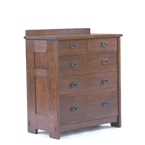 Appraisal: GUSTAV STICKLEY Chest of drawers in two over-three configuration paneled