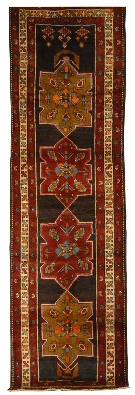 Appraisal: ORIENTAL RUG NORTHWEST PERSIAN RUNNER ' x ' Four gabled