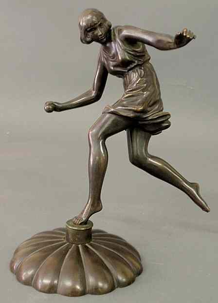 Appraisal: Bronze statue of a girl throwing a ball c mounted