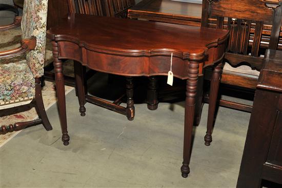 Appraisal: TILT TOP GAME TABLE Mahogany having a shaped top reeded