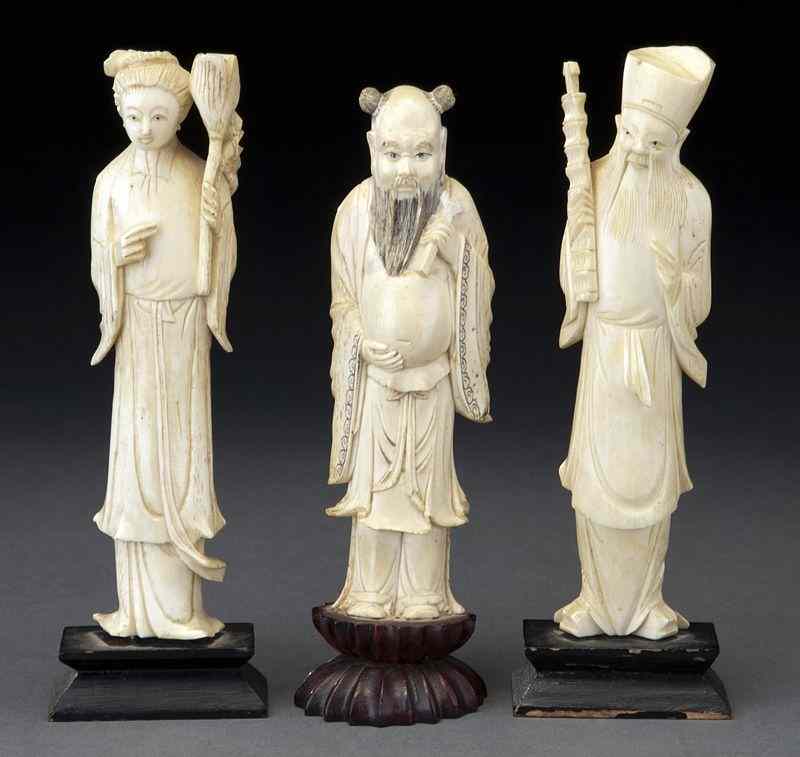 Appraisal: Carved ivory figures International shipping IS NOT available on this