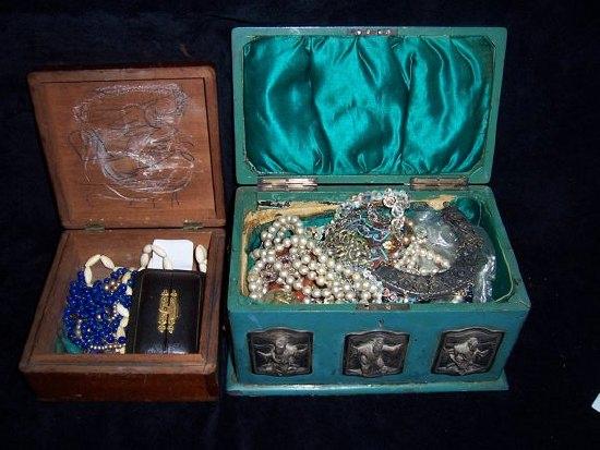 Appraisal: A large quantity of costume jewellery contained in a painted