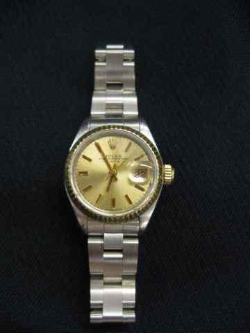 Appraisal: Rolex Ladies Wristwatch stainless with gold bezel champagne dial working