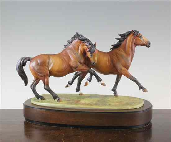 Appraisal: A Royal Worcester Limited Edition model 'Galloping Ponies' by Doris