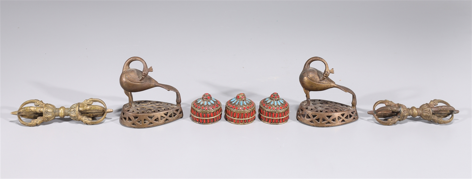 Appraisal: Group of seven metal objects including two bronze bird ornaments