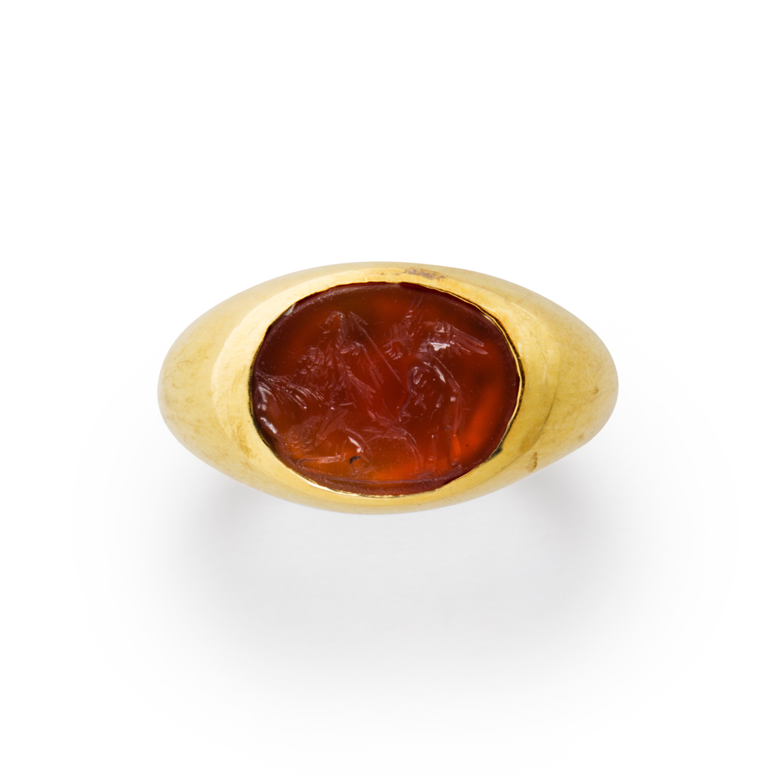 Appraisal: A CARNELIAN AND EIGHTEEN KARAT GOLD RING A carnelian and