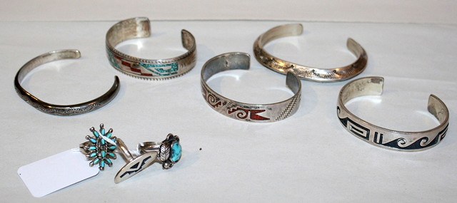 Appraisal: A COLLECTION OF NAVAJO AND ZUNI SILVER JEWELLERY five bracelets