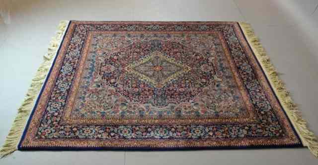 Appraisal: A FINE HAND-MADE WOOL PERSIAN AREA RUGLight blue fiend with