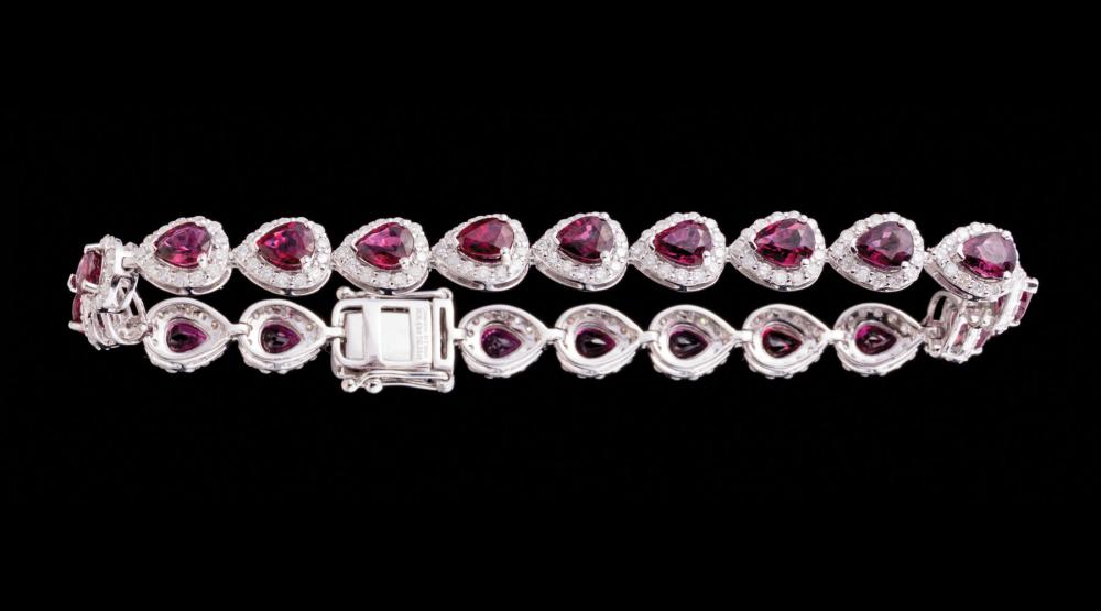 Appraisal: Platinum Ruby and Diamond Bracelet prong set pear-shape mixed cut