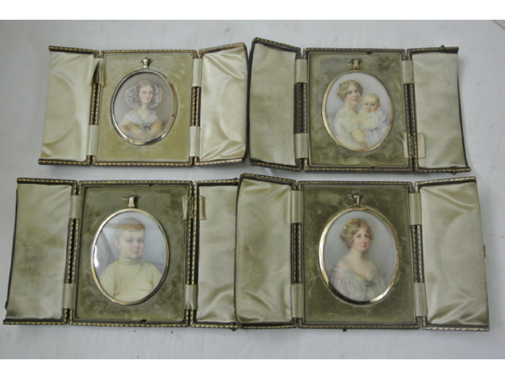 Appraisal: A group of four portrait miniatures of oval form comprising