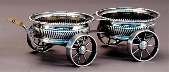 Appraisal: British silverplate wine trolley late th centurytwo wine coasters joined