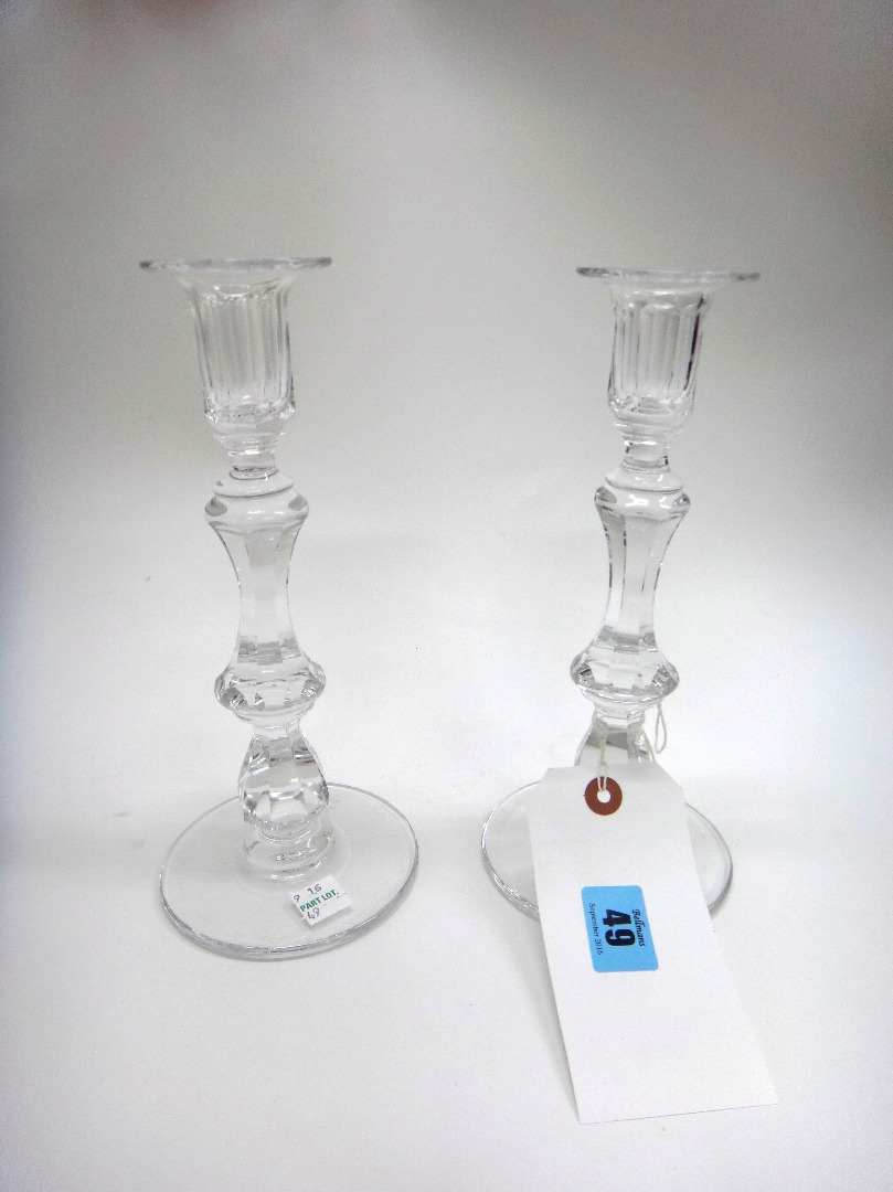 Appraisal: A set of three facet cut glass candlesticks th century