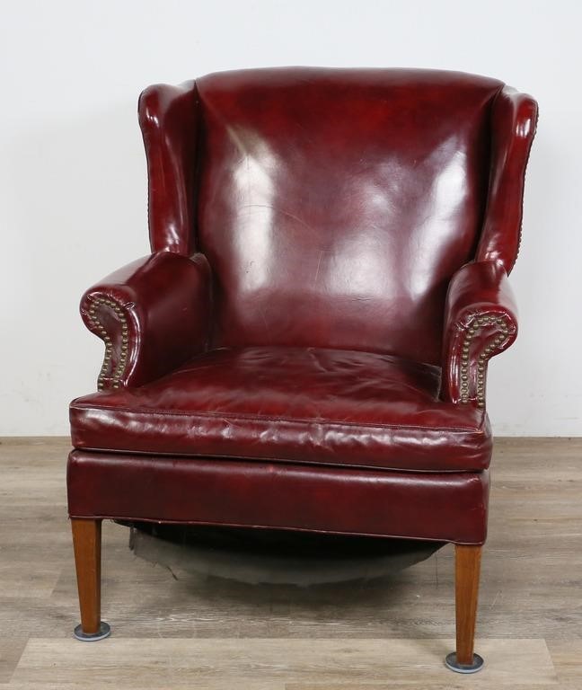 Appraisal: CHESTERFIELD STYLE LEATHER ARMCHAIRChesterfield style leather armchair American New York