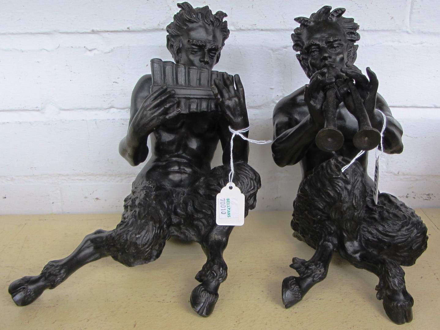 Appraisal: A pair of patinated bronze figures early th century each