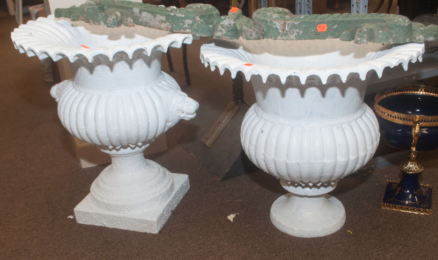 Appraisal: Two cast iron urns Undernumber