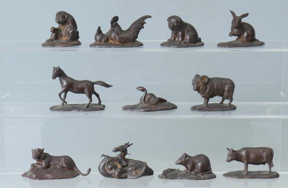 Appraisal: MINIATURE JAPANESE BRONZE ANIMALS A menagerie of animals signed by