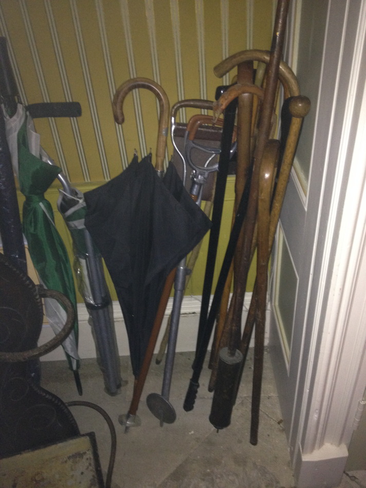 Appraisal: Various walking sticks umbrella and two shooting sticks