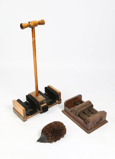 Appraisal: A DOOR STEP WOODEN FOOT BRUSH by The Lord Roberts