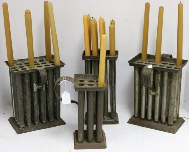 Appraisal: FOUR TH C TIN CANDLE MOLDS TO INCLUDE TWO CANDLE