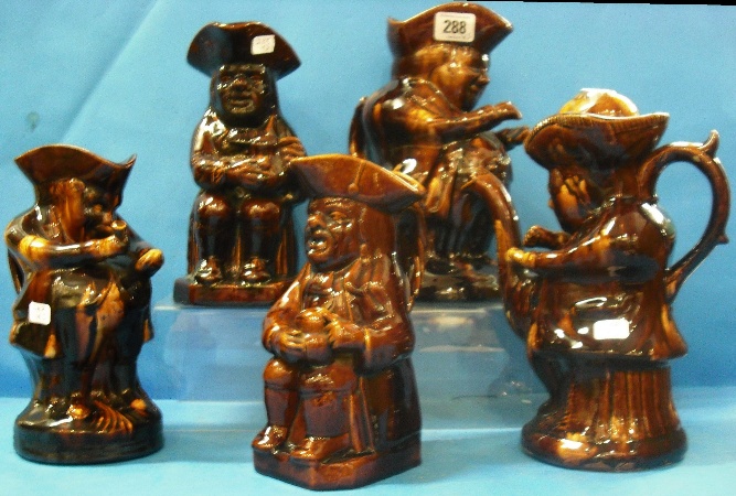 Appraisal: A Collection of Treacle Glazed Toby Jugs comprising The Snuff